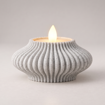 DiyArts Fluted Tealight Candle Holder in White Marble, sculptural ribbed fins with an LED tealight, studio product shot