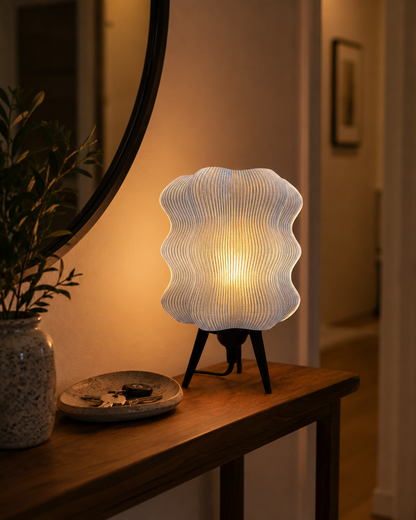 Wave Table Lamp in Matte White on an entryway console table