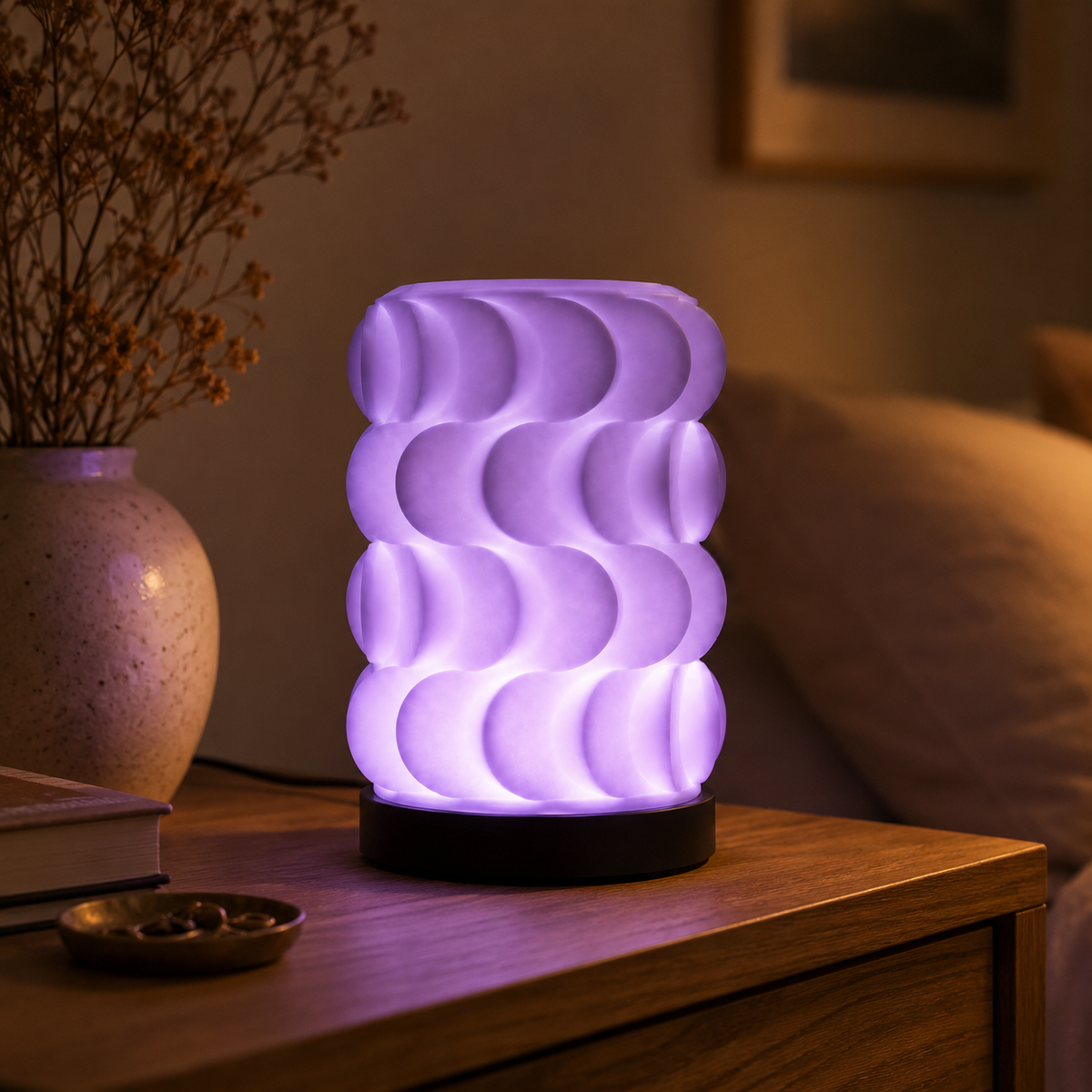 Scallop Table Lamp in Purple glowing in a cozy room