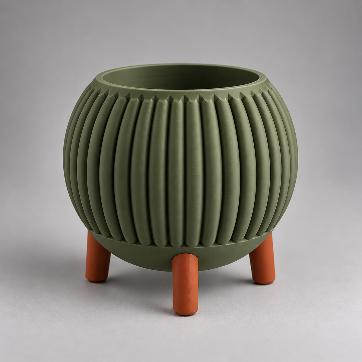 DiyArts Ribbed Planter with Legs in Moss Green with burnt rust legs, fluted mid-century plant pot, studio product shot
