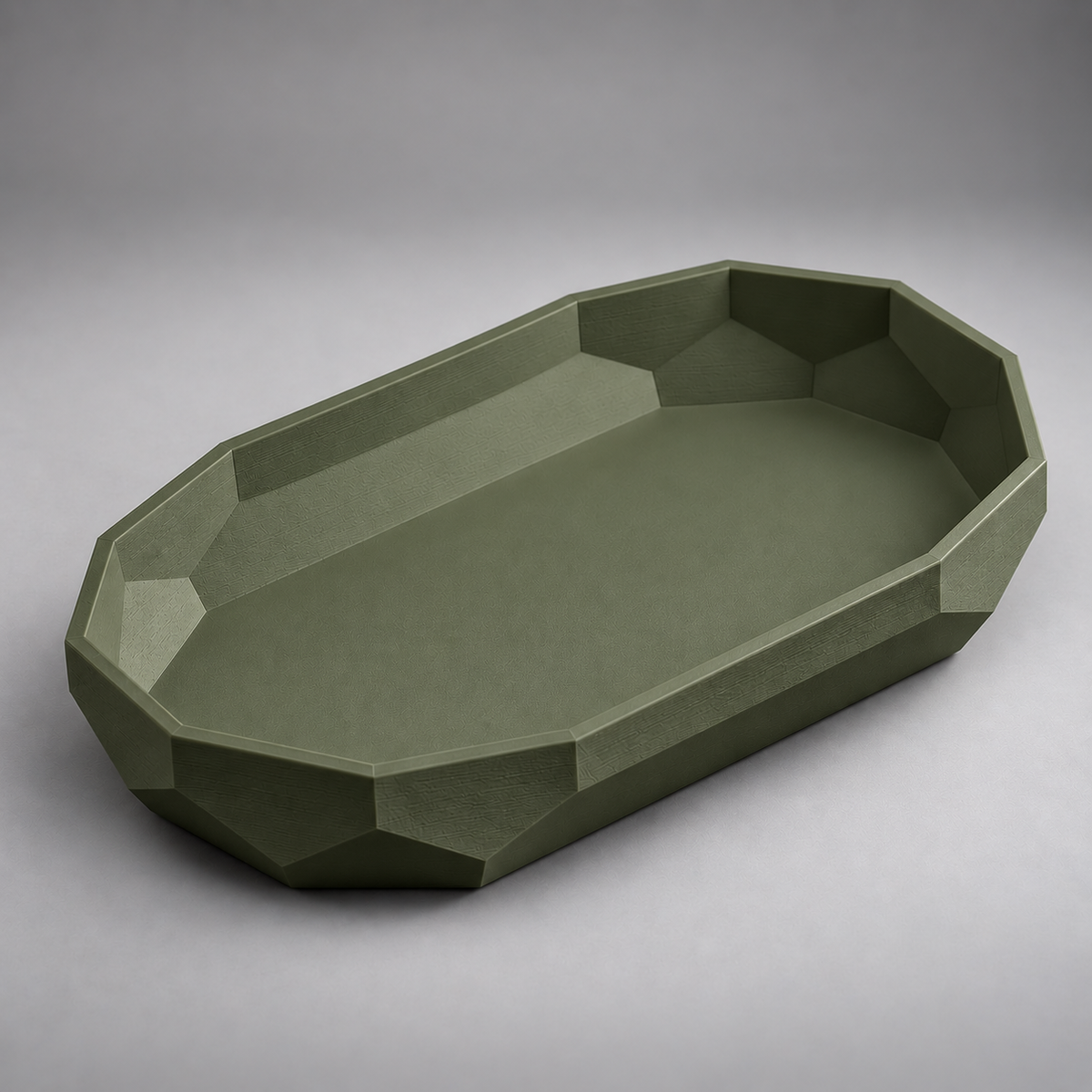 DiyArts Facet Oval Catch-All Tray in Moss Green, faceted geometric wall, studio product shot