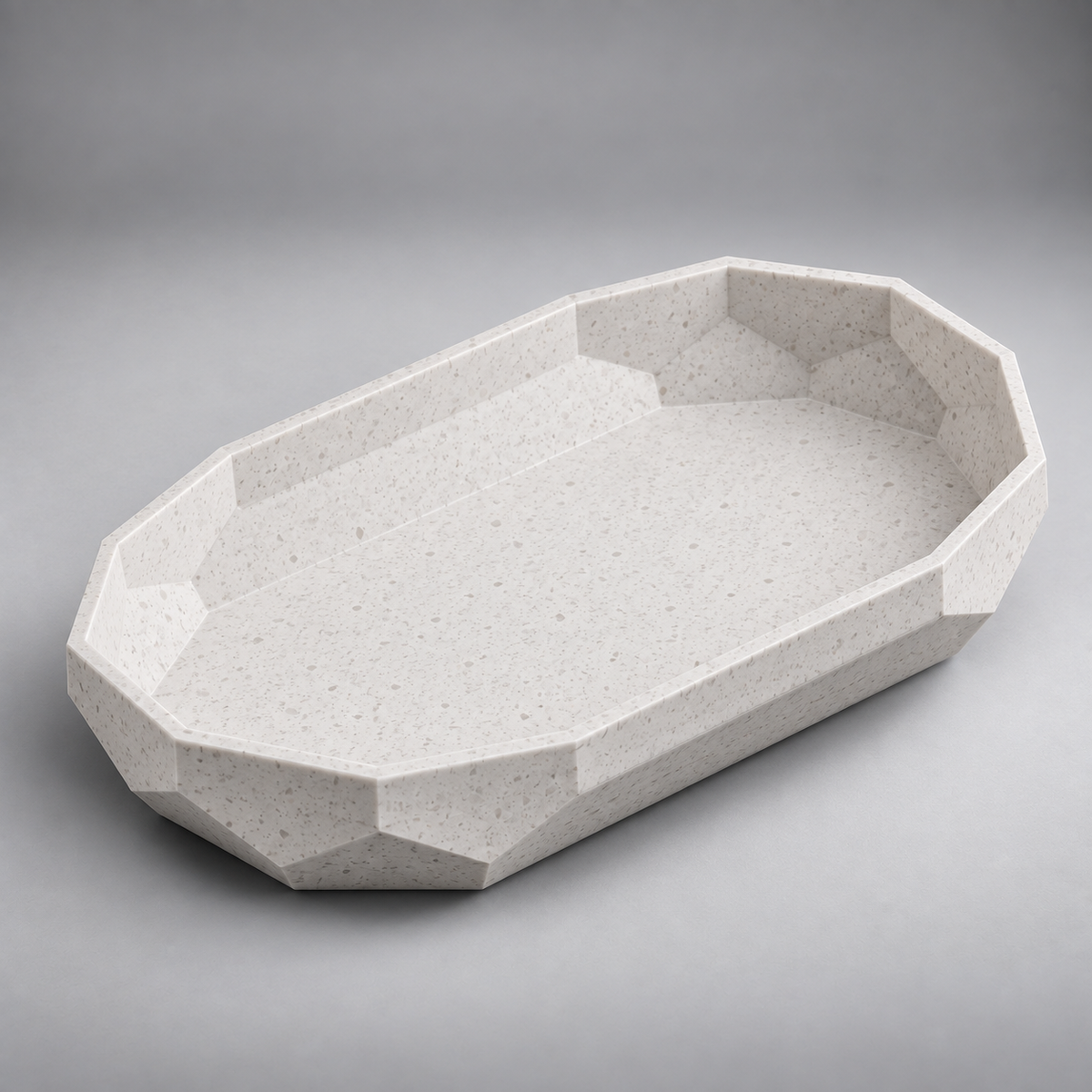 DiyArts Facet Oval Catch-All Tray in White Marble, speckled stone-look finish, studio product shot