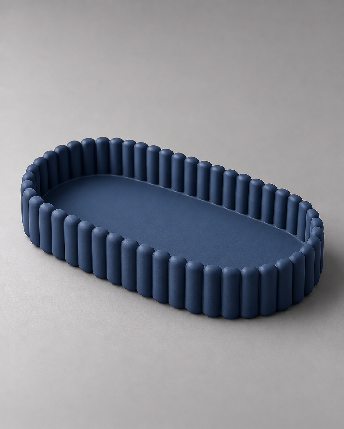 DiyArts Ripple Catch-All Tray in Deep Indigo Blue, fluted oval dish, studio product shot