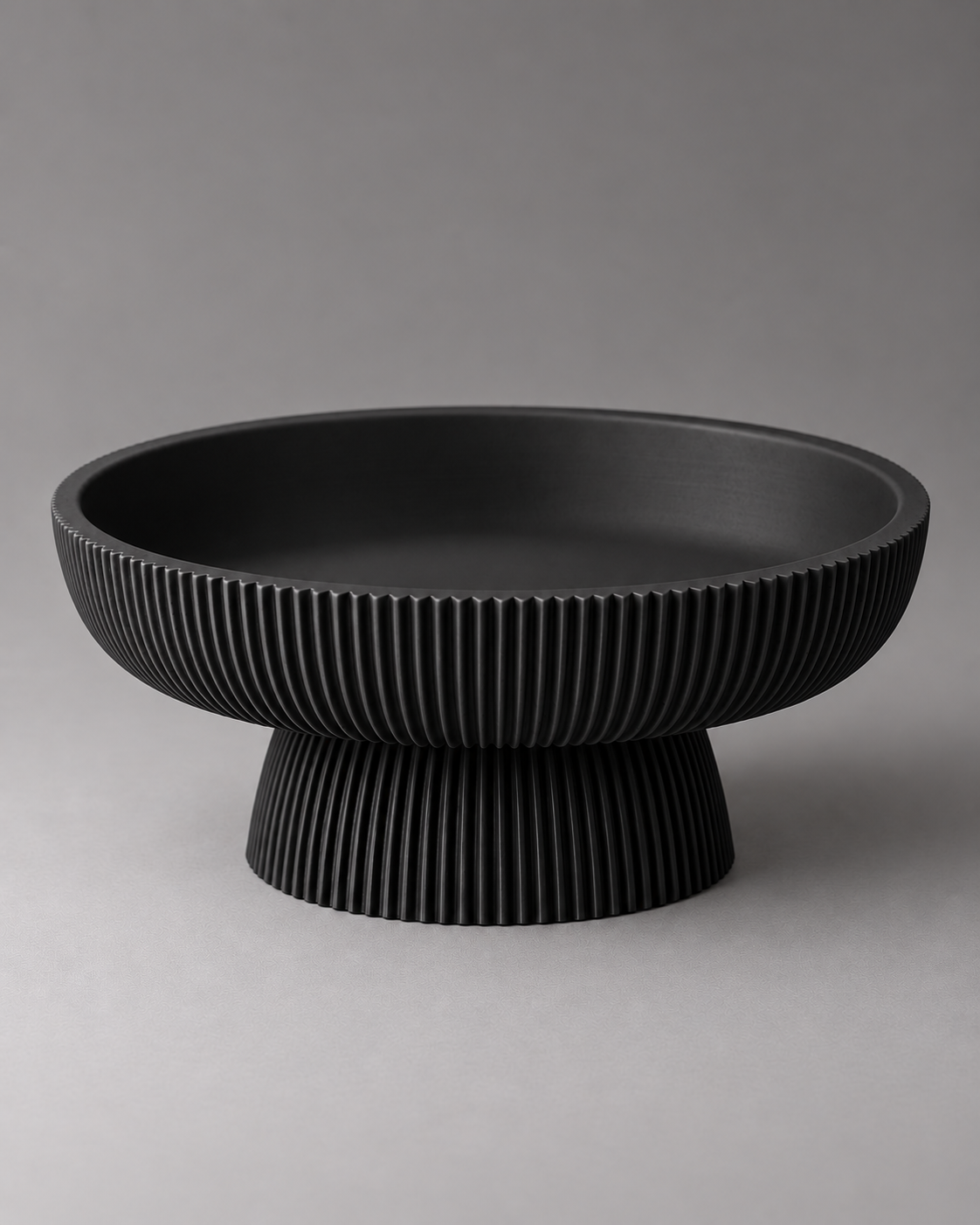 DiyArts Column Pedestal Bowl in all Matte Black, fluted bowl and base, studio product shot