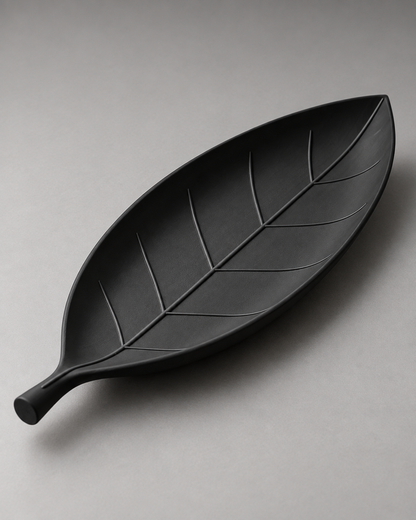 DiyArts Leaf Catch-All Tray in Matte Black, leaf-shaped dish with sculpted veins, studio product shot