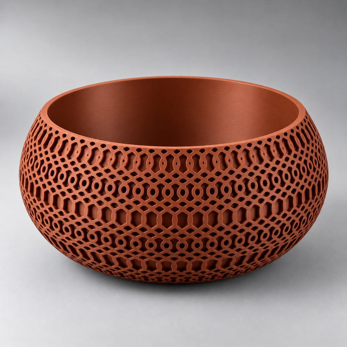 DiyArts Lattice Catch-All Bowl in Burnt Rust, openwork mesh lattice wall, studio product shot