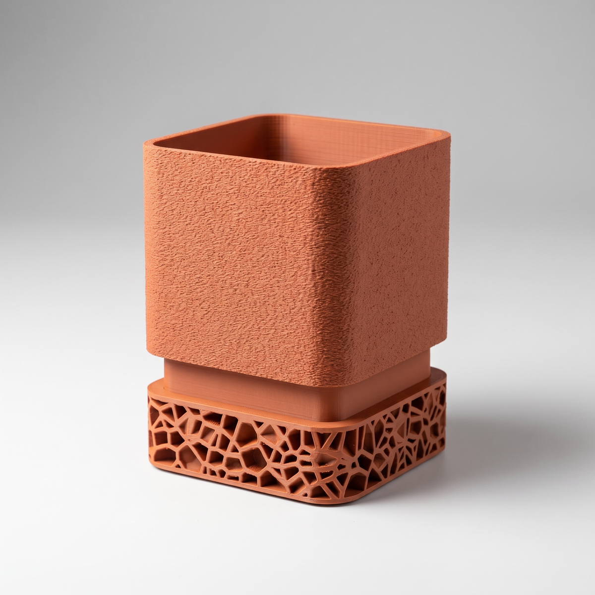 DiyArts Voronoi Square Planter with Drip Tray in Burnt Rust, textured cube pot on Voronoi lattice base, studio product shot