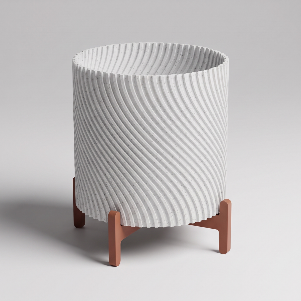 DiyArts Twisted Planter with Stand in White Marble with burnt rust cross stand, speckled stone-look finish, studio product shot