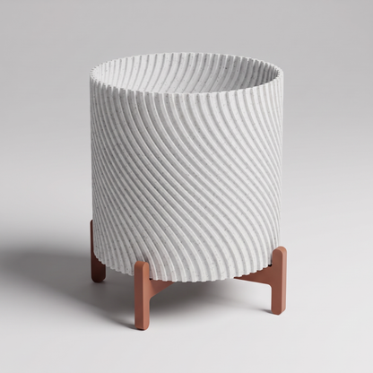 DiyArts Twisted Planter with Stand in White Marble with burnt rust cross stand, speckled stone-look finish, studio product shot