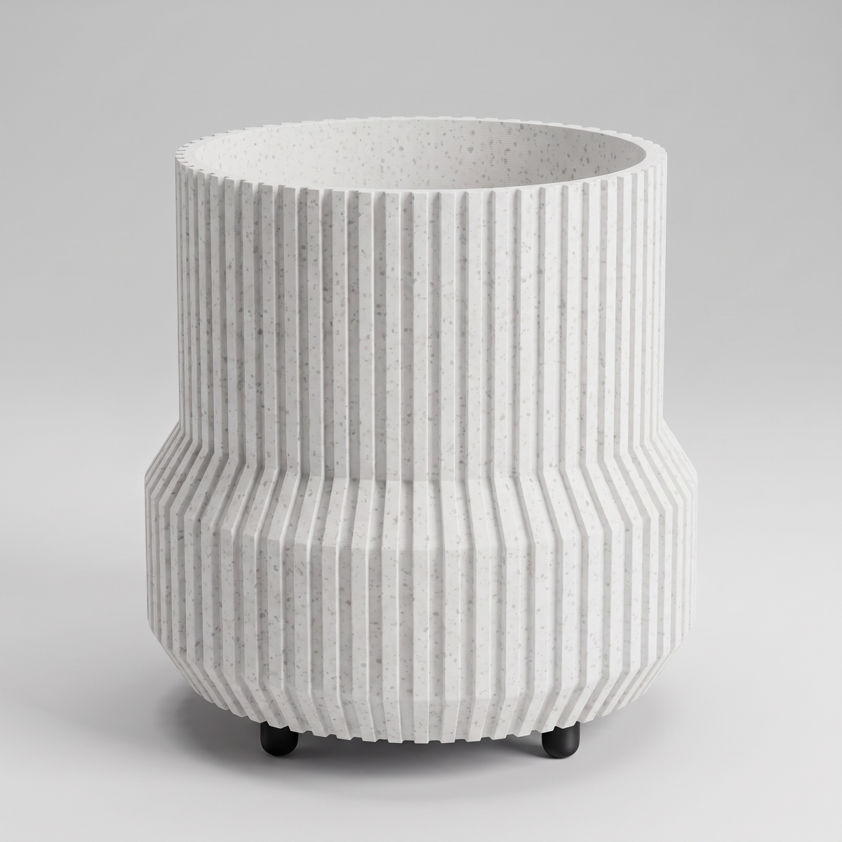 DiyArts Chubby Fluted Planter with Feet in White Marble with matte black feet, speckled stone-look finish, studio product shot