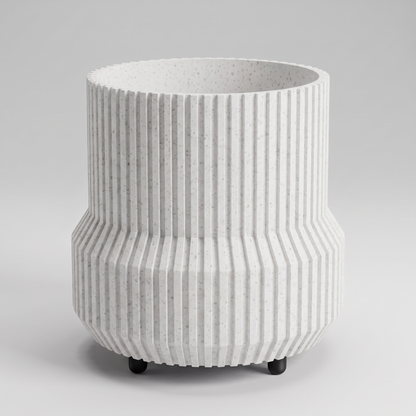 DiyArts Chubby Fluted Planter with Feet in White Marble with matte black feet, speckled stone-look finish, studio product shot
