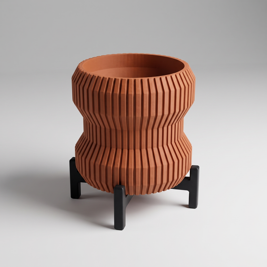 DiyArts Waisted Fluted Planter with Stand in Burnt Rust with matte black cross stand, 5 inch hourglass ribbed plant pot, studio product shot