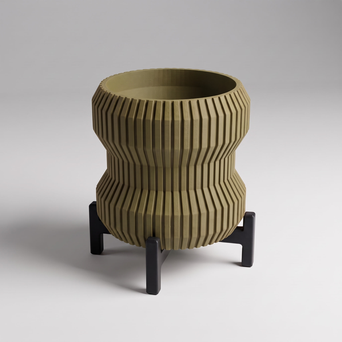DiyArts Waisted Fluted Planter with Stand in Moss Green with matte black cross stand, 5 inch hourglass ribbed plant pot, studio product shot