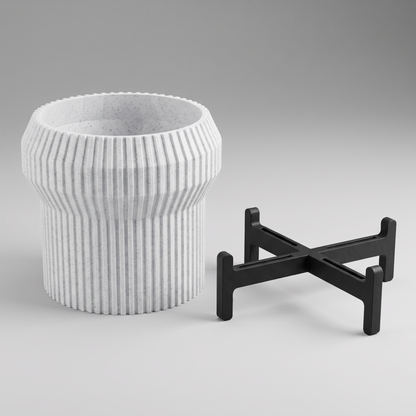 Flared Fluted Planter shown apart - flared fluted pot in White Marble and the matte black slotted cross stand with upturned tabs