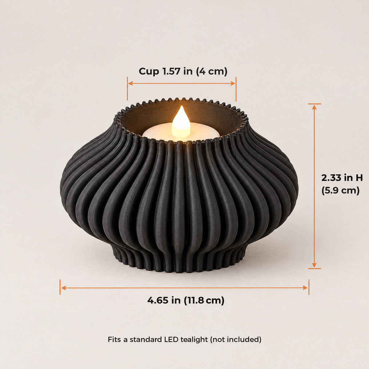Fluted Tealight Candle Holder dimensions: 4.65 inches wide, 2.33 inches tall, 1.57 inch cup for a standard LED tealight