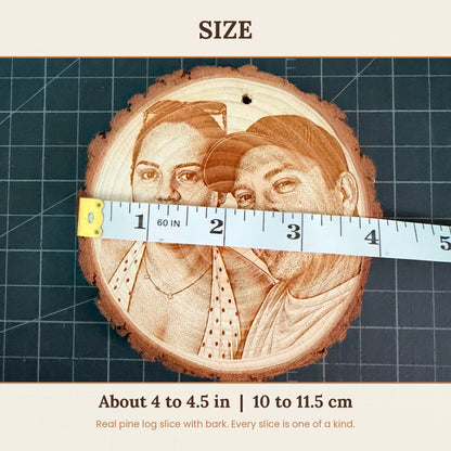 Tape measure across the photo engraved pine wood slice showing about 4 to 4.5 inches